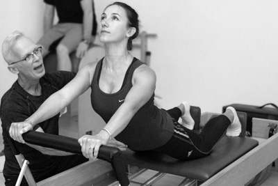 Zhivka Yaneva stretch exercise on the reformer in the Palma Pilates Studio in The Hague