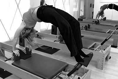 Catarina Palma on the reformer in the Pilates Studio Palma Personal Training Den Haag