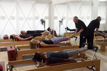 De Pilates Studio - Palma personal Training workshop with Bob Liekens Juni 2014 exercise on the reformer