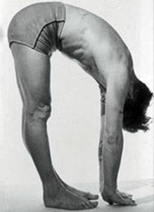 Joseph Pilates bend over